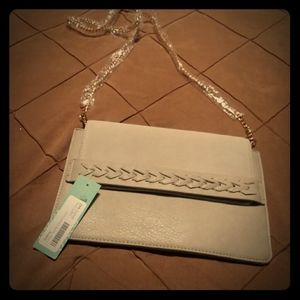 Suede detail clutch